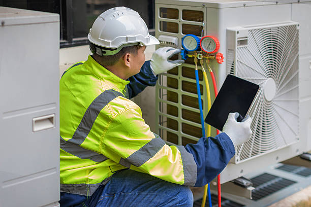 Professional Air Duct Cleaning technician working in Lake Mills, IA